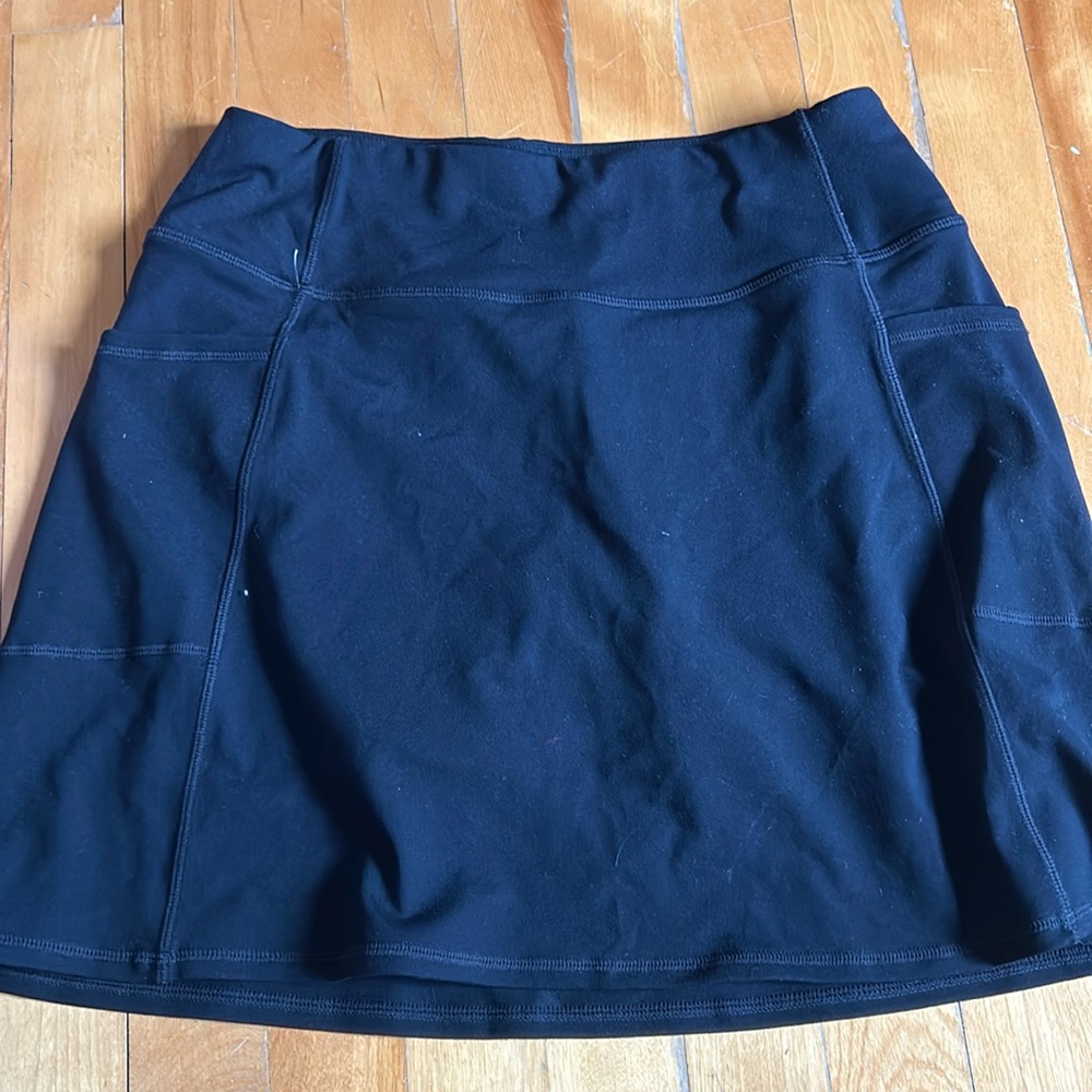 Black skechers sport skirt with integrates shorts